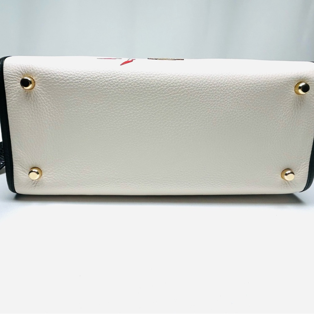 Disney X Coach Dempsey Carryall With Cruella Motif
Brand new with tags - Picture 13 of 15